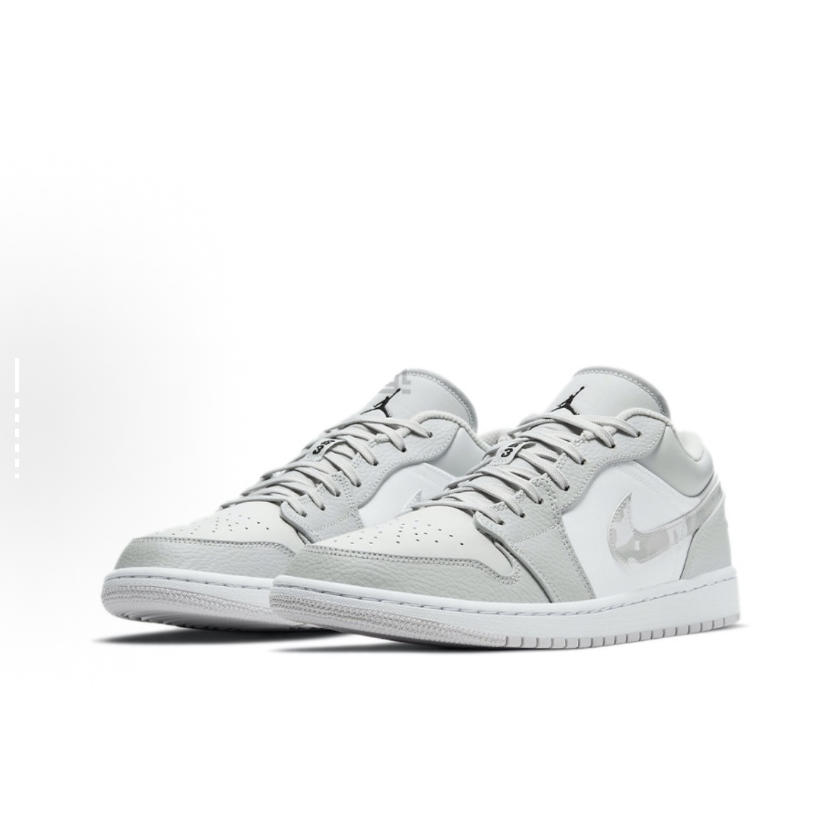 Air Jordan 1 Low 'White Camo' gray-white sneakers: styling tips for camo Jordans. Style guide visual.